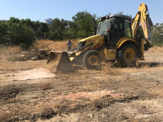 Rayonda tikinti aparılan binaların hasara alınmış ərazilərində  sanitar təmizlik işləri aparılıb.